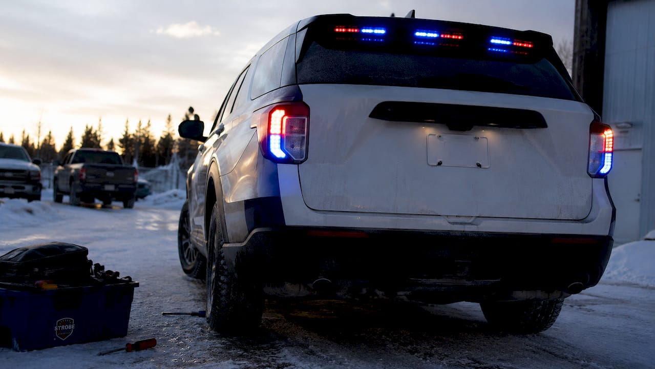 Close-up of LED hideaway strobe lights on vehicle grille