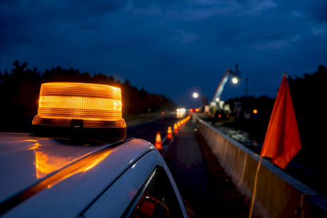 Amber warning beacon beside Canadian roadside work